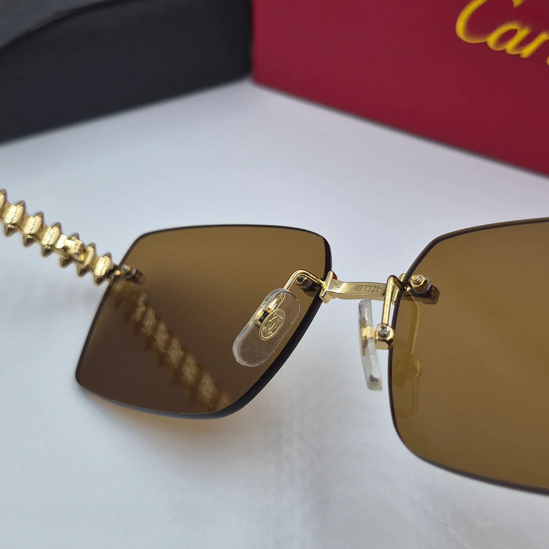 CARTIER CLASH CT0545S doré marron