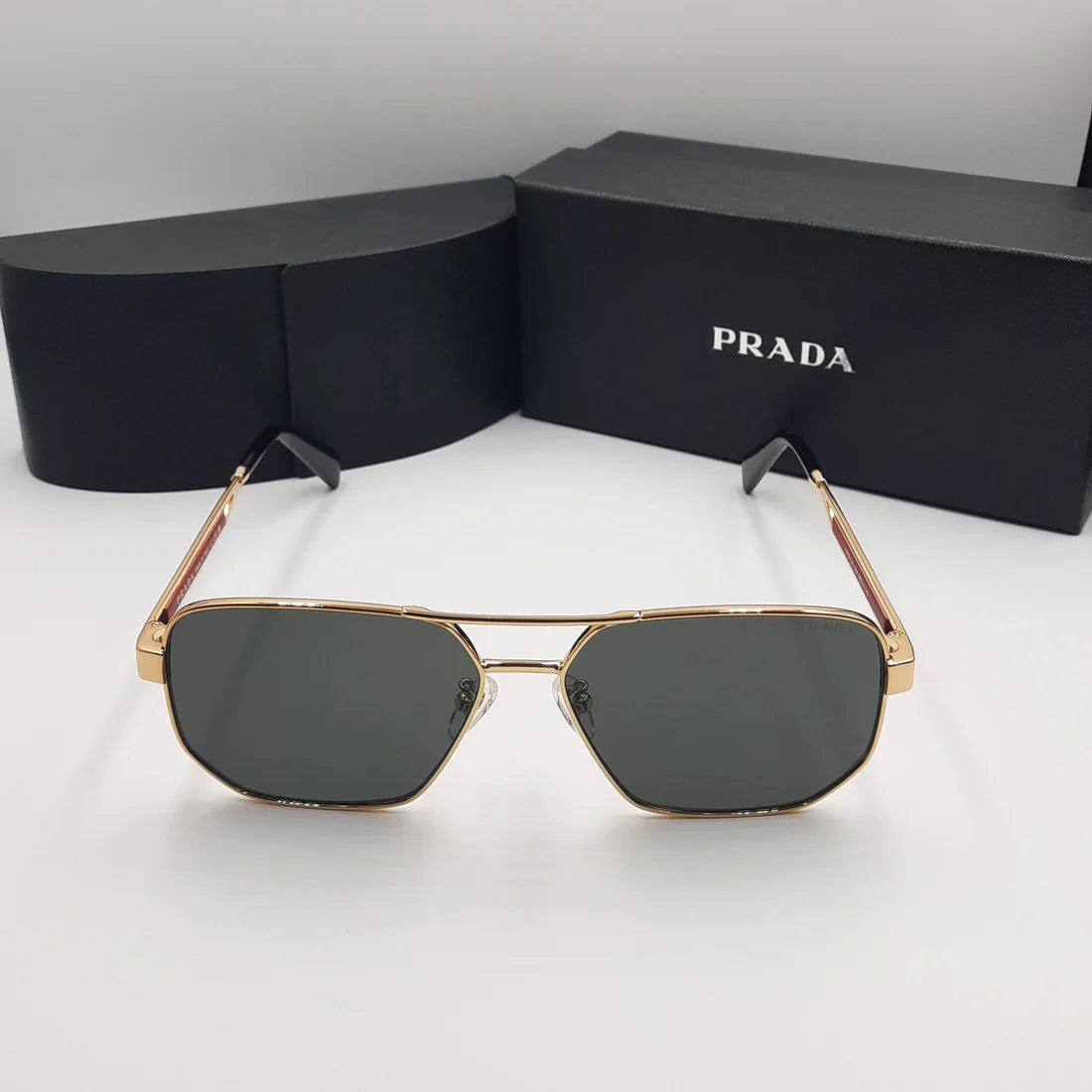 PRADA OPS51ZS rouge doré noir