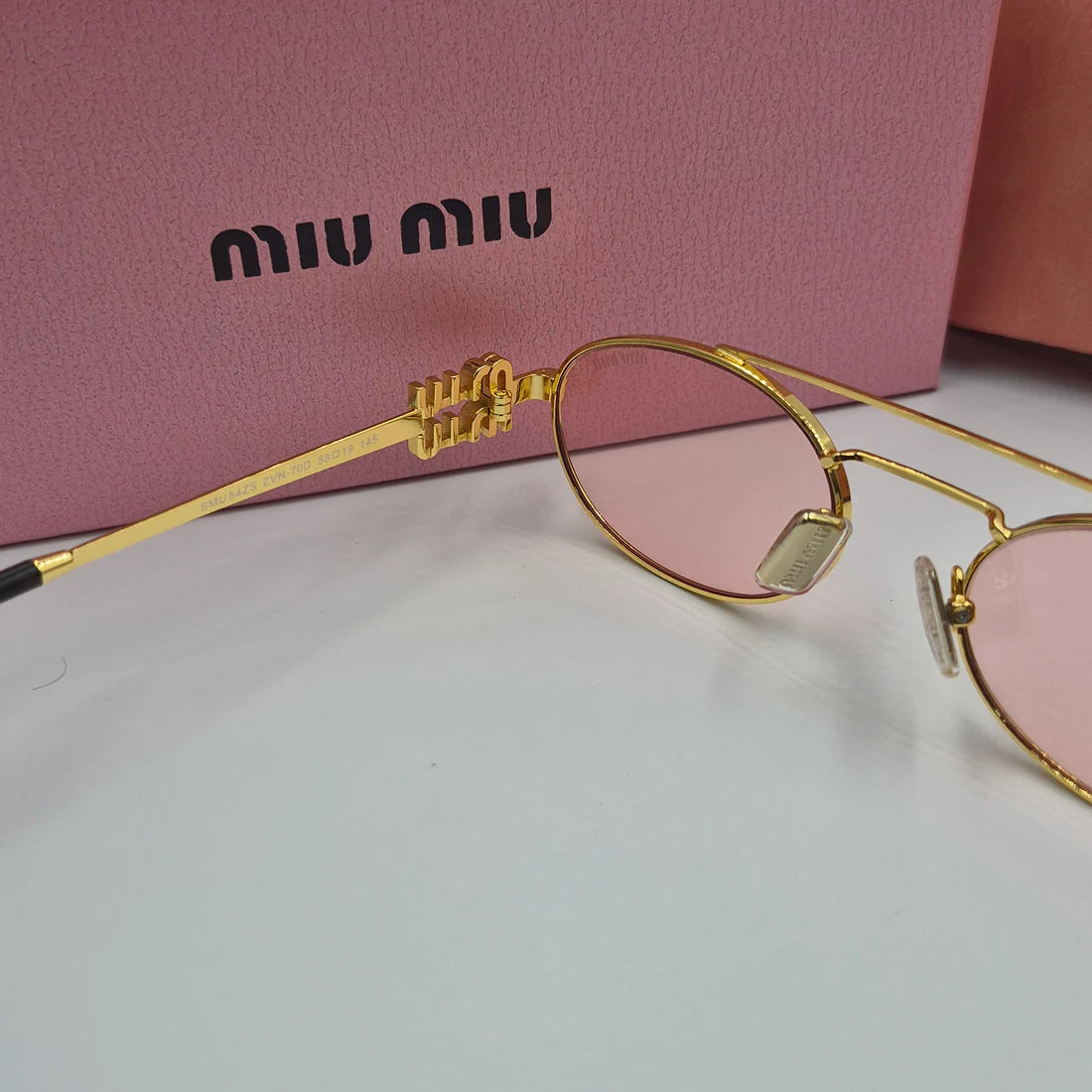 MIUMIU SMU54ZS doré rose saumon