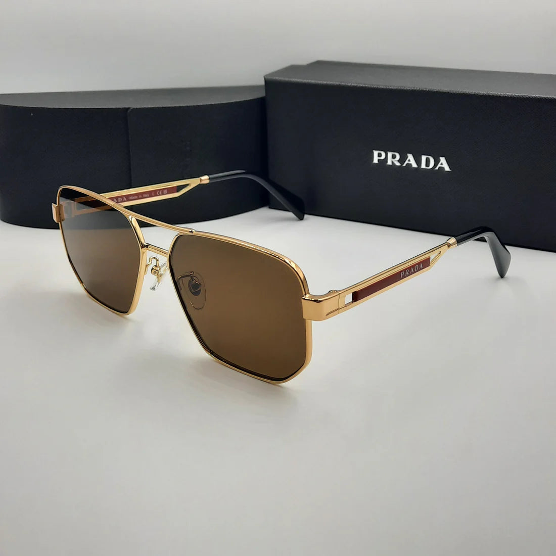 PRADA OPS51ZS rouge doré marron