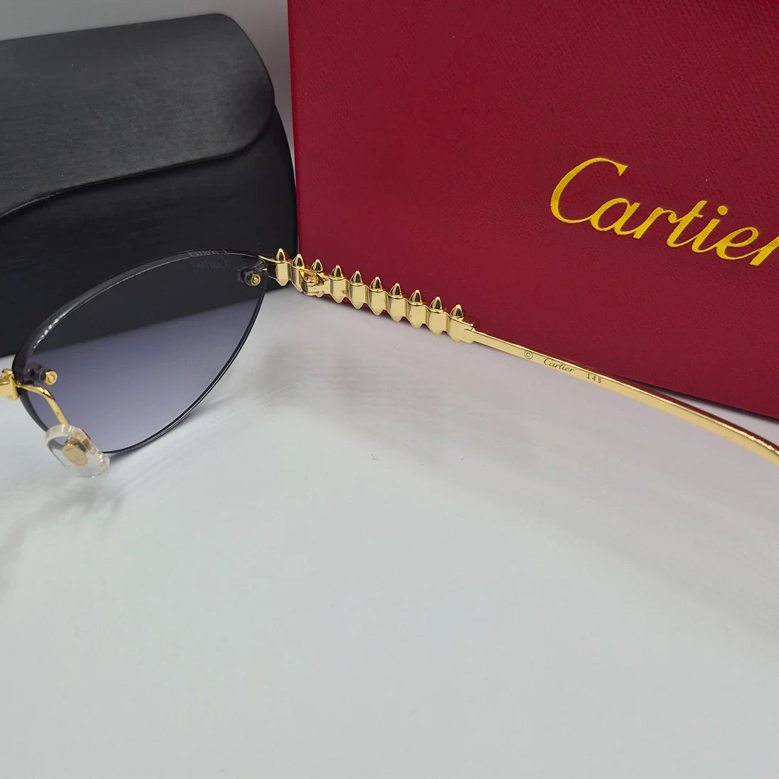 CARTIER CLASH CT0543S doré noir deg