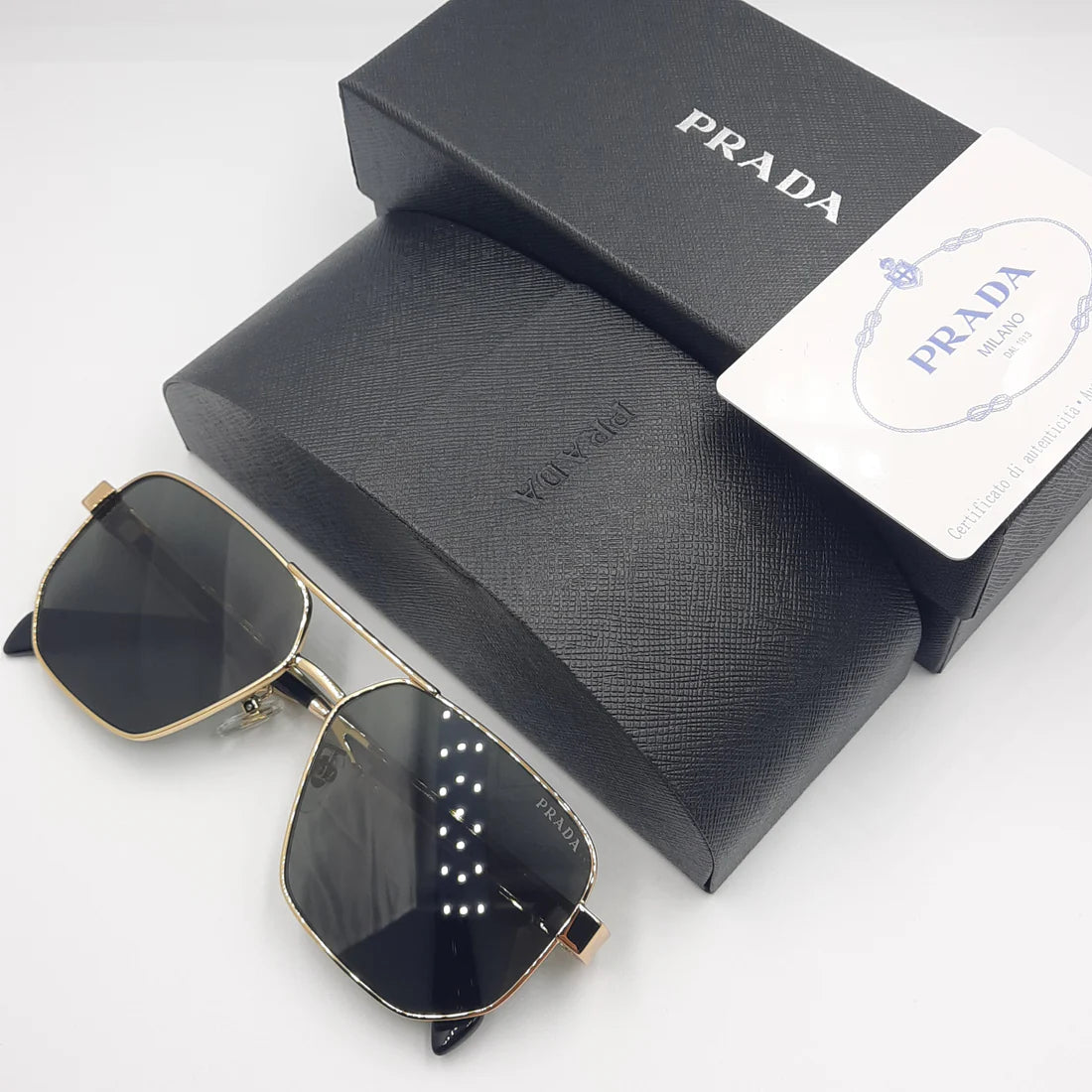 PRADA OPS51ZS rouge doré noir