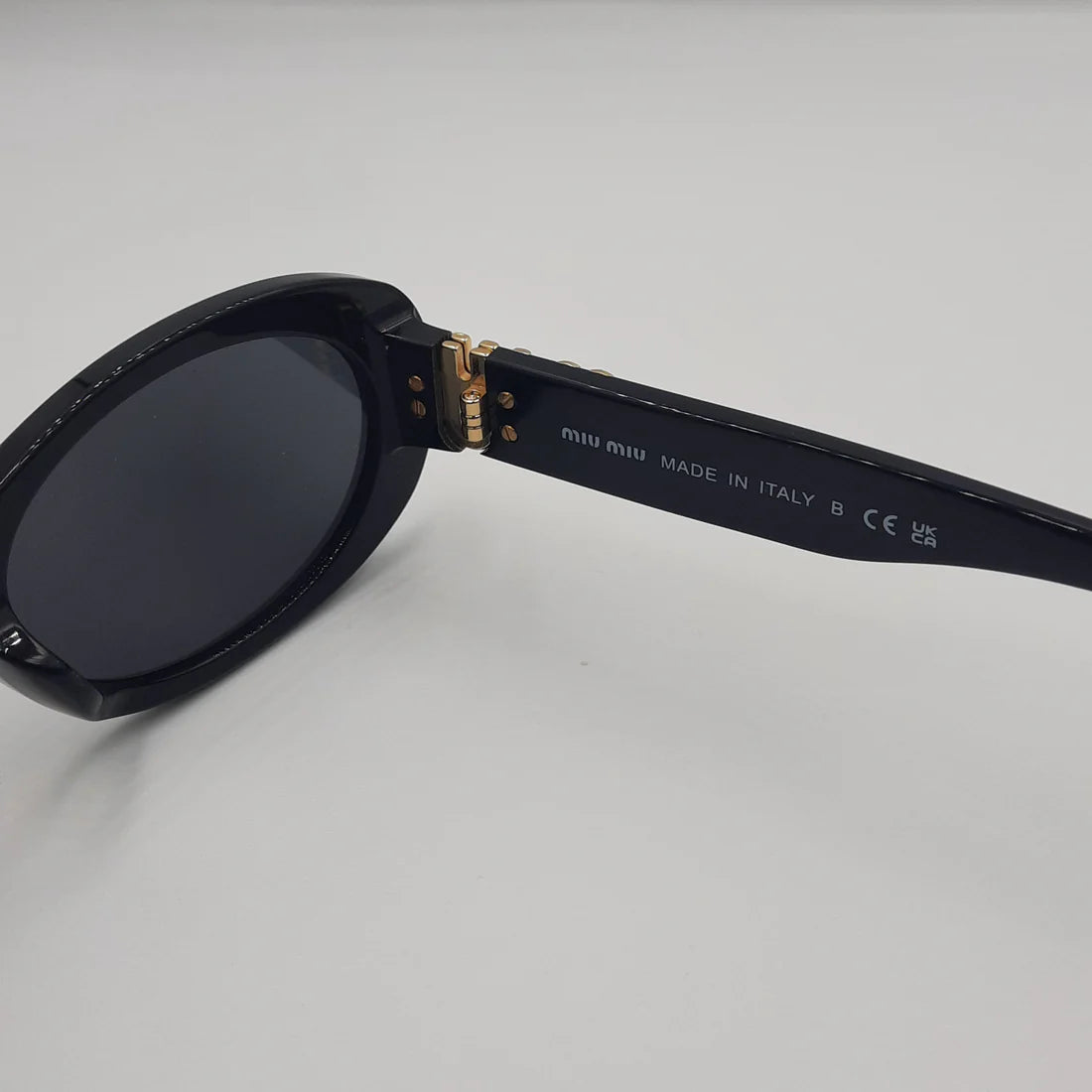 MIUMIU SM06Z Noir/Doré