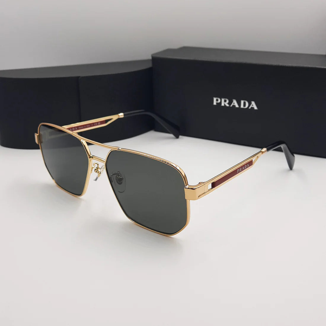 PRADA OPS51ZS rouge doré noir