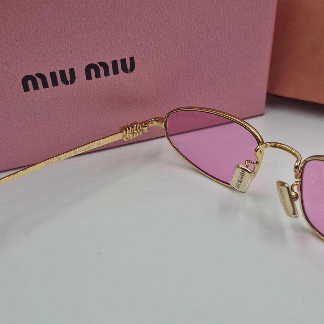MIUMIU SMU52S doré rose