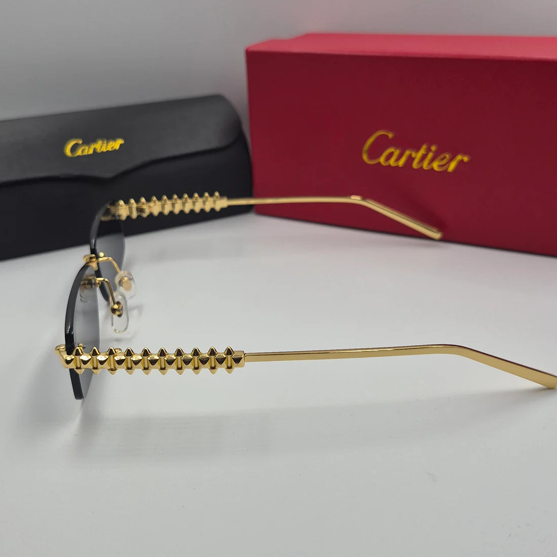 CARTIER CLASH CT0544S doré noir
