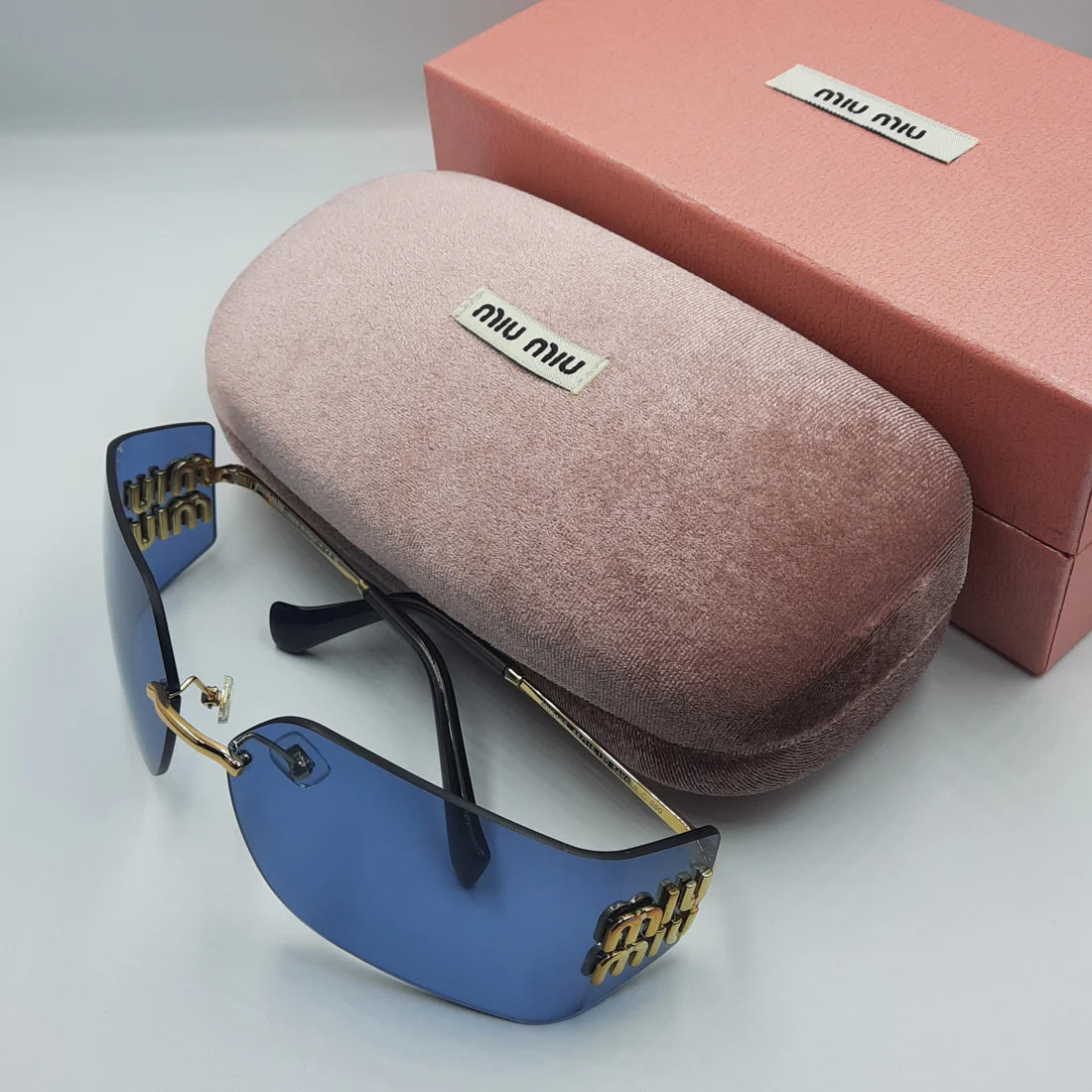 MIUMIU MU54YS bleu/GOLD