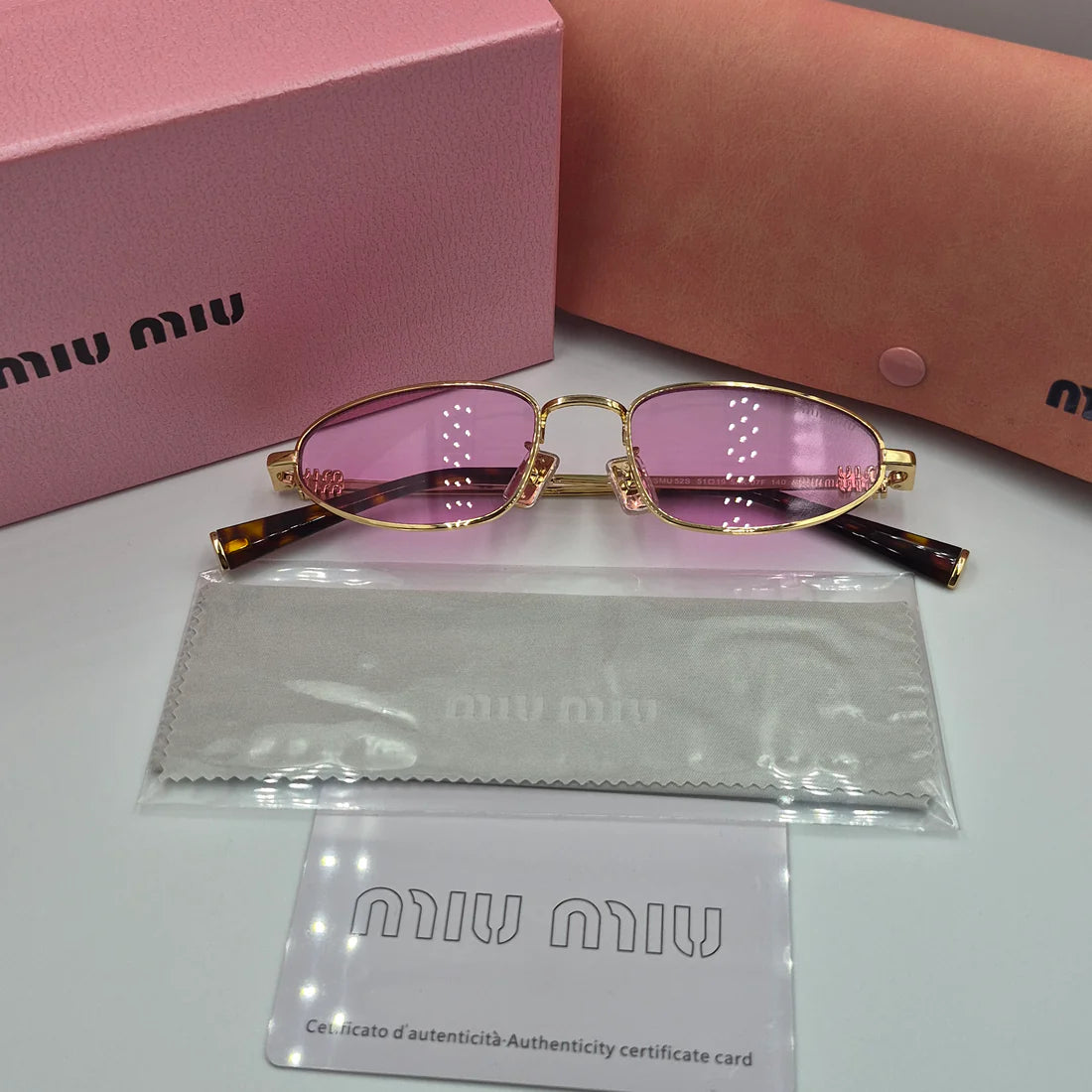 MIUMIU SMU52S doré rose