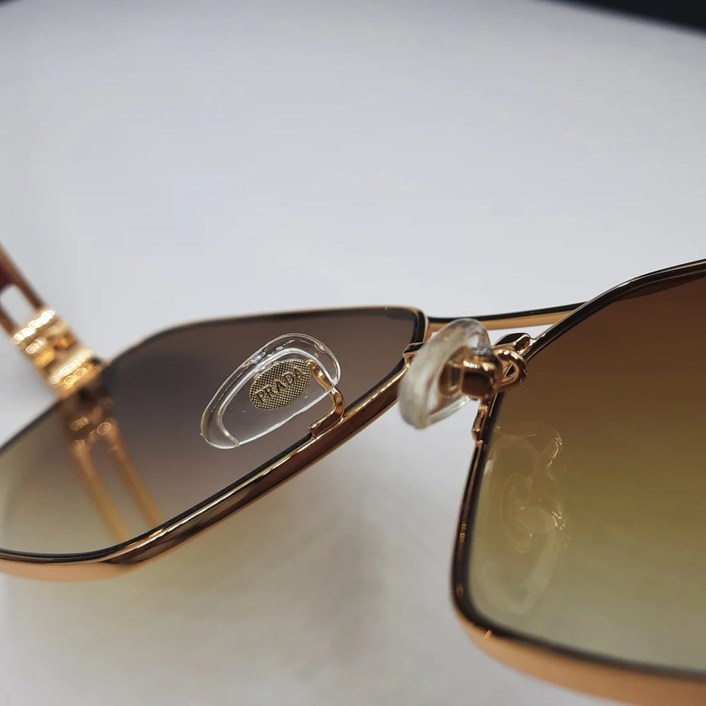 PRADA OPS51ZS rouge doré marron deg