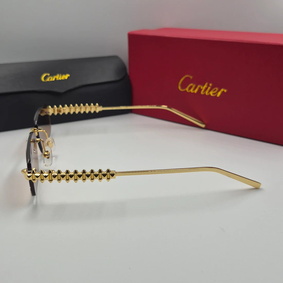 CARTIER CLASH CT0544S doré marron