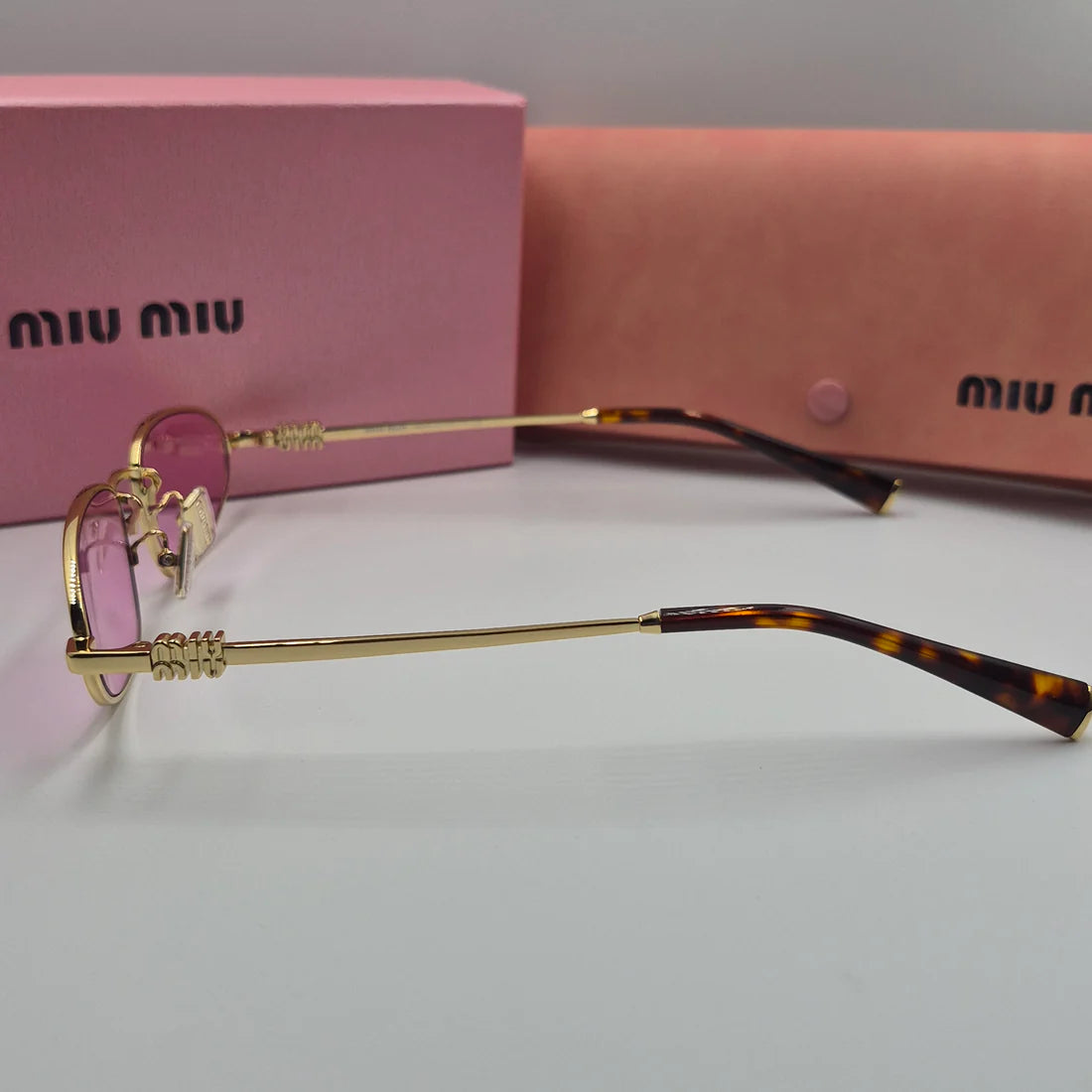 MIUMIU SMU52S doré rose