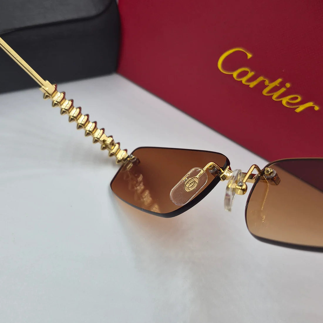 CARTIER CLASH CT0544S doré marron