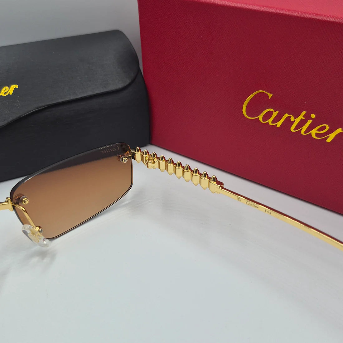 CARTIER CLASH CT0544S doré marron