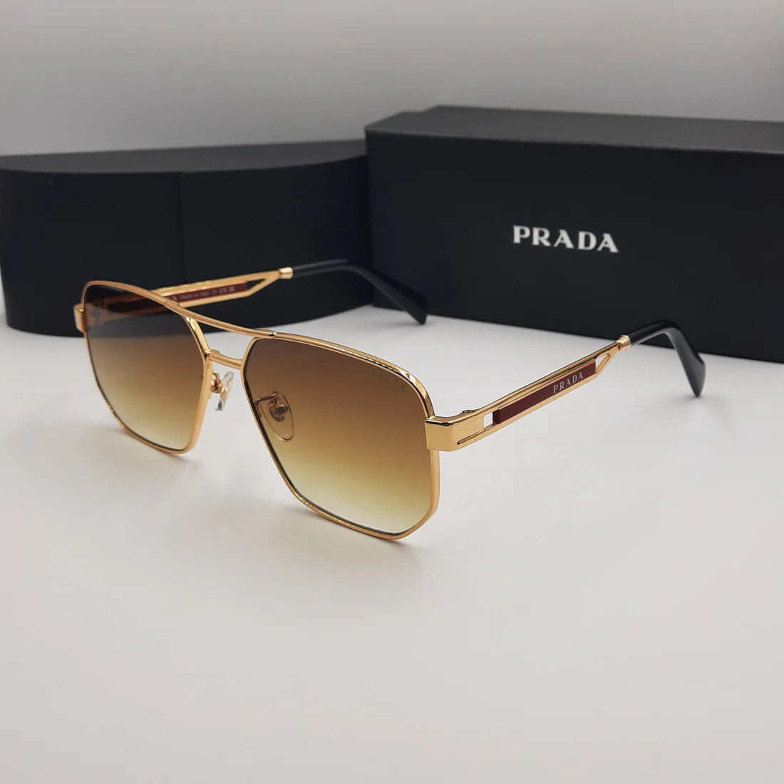 PRADA OPS51ZS rouge doré marron deg