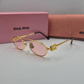 MIUMIU SMU54ZS doré rose saumon
